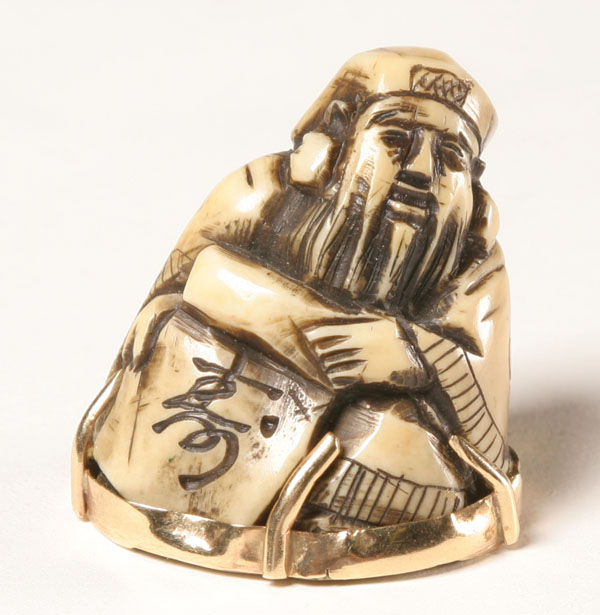 Japanese carved ivory netsuke scholar