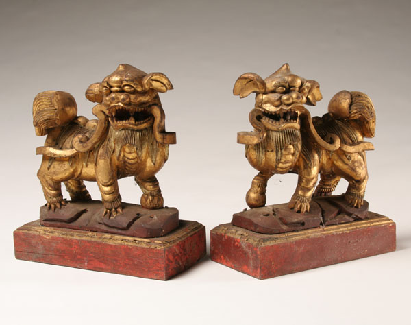 Pair hand carved foo dogs; ferocious