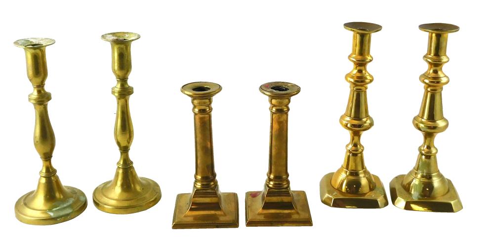 THREE PAIR EARLY BRASS CANDLESTICKS: