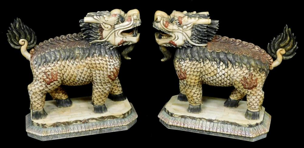 ASIAN: PAIR OF CARVED AND STAINED