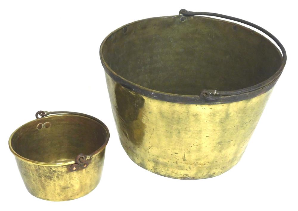 TWO BRASS BUCKETS: THE LARGER,