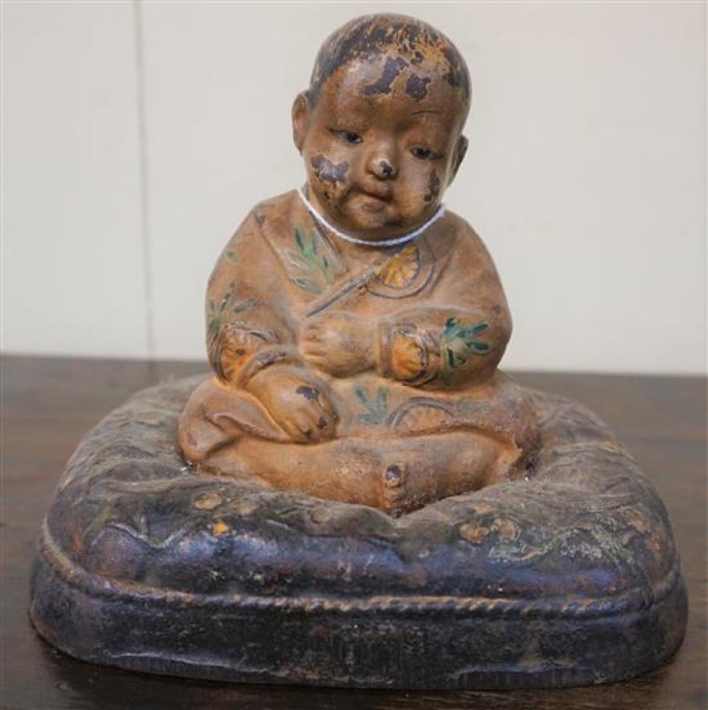 CAST IRON FIGURE OF A SEATED CHILDCast 31ee37