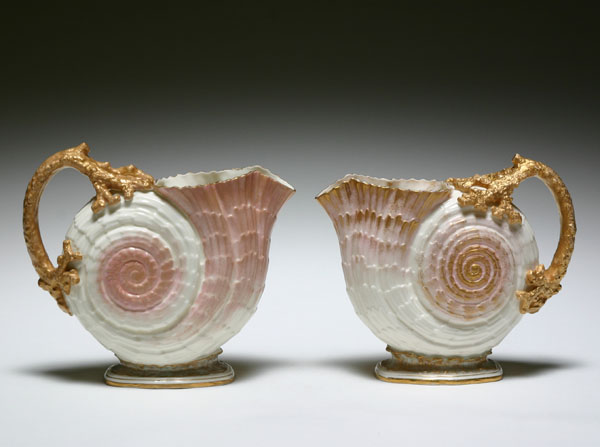 Pair Willets Belleek nautilus pitchers