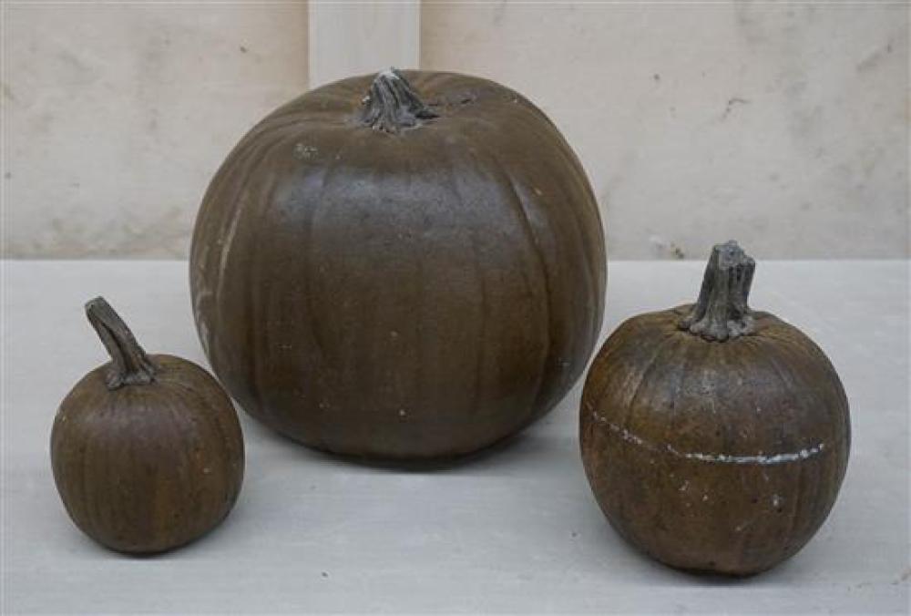 THREE CAST CEMENT PUMPKIN ORNAMENTSThree