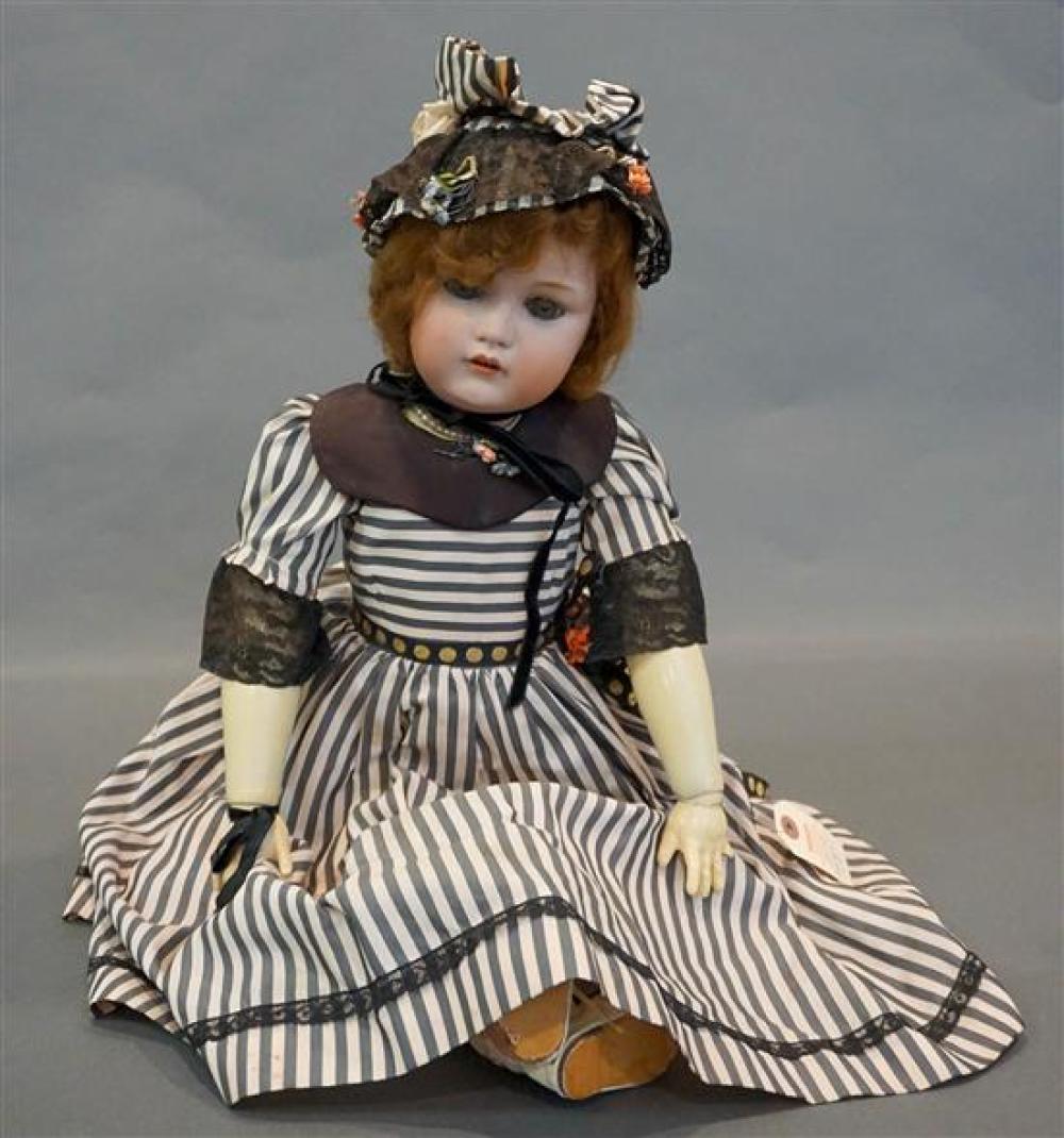 GERMAN BISQUE HEAD DOLL WITH CLOTH