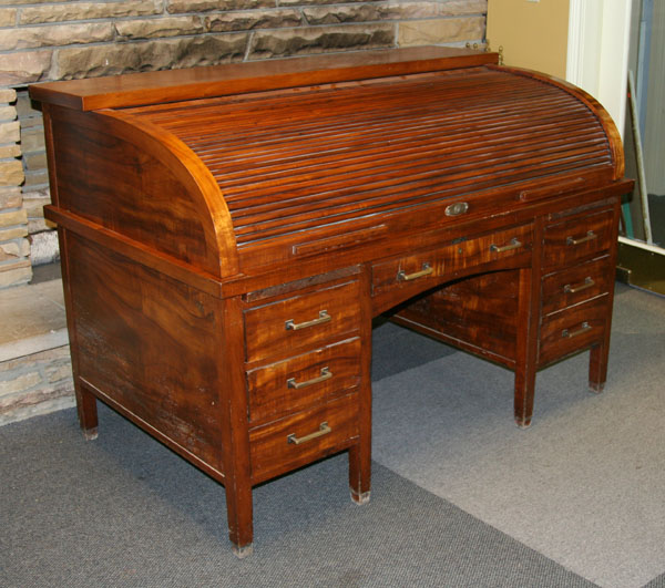 Double pedestal roll-top desk;