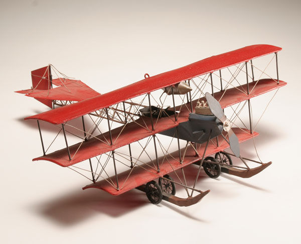 Hand crafted metal tri-plane model;
