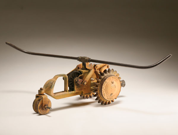 Cast iron self propelled figural lawn