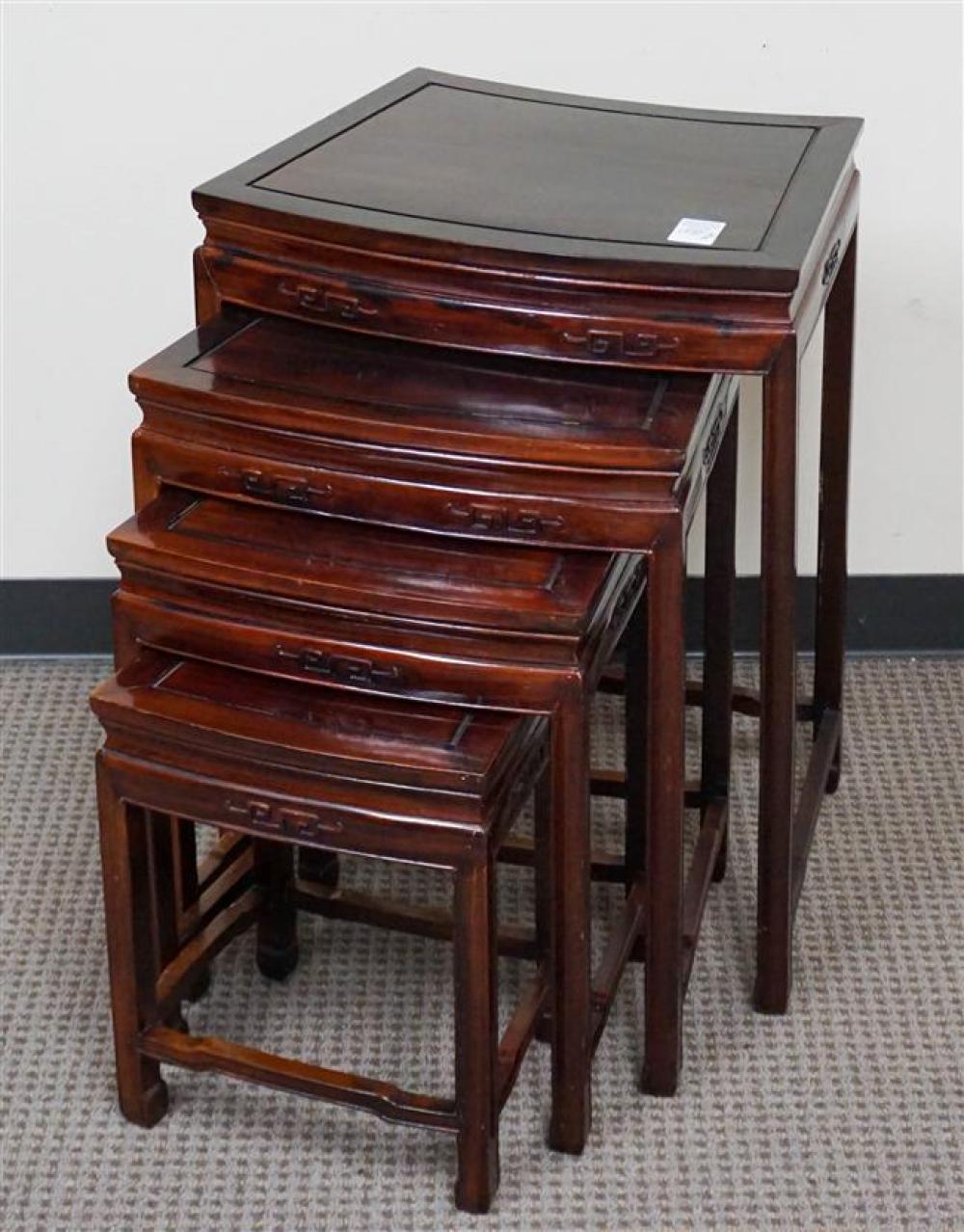 NEST OF FOUR CHINESE HARDWOOD TABLES,