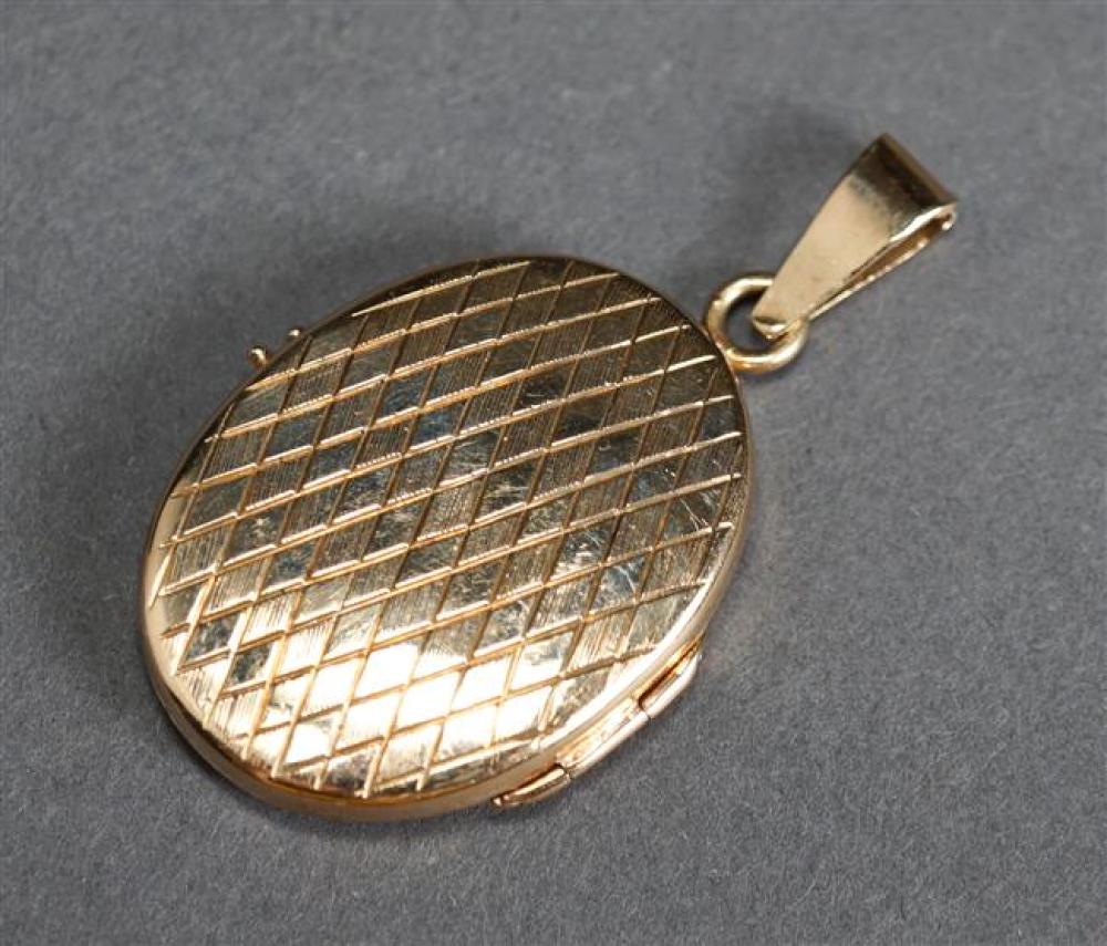 14 KARAT YELLOW GOLD LOCKET , 3.6