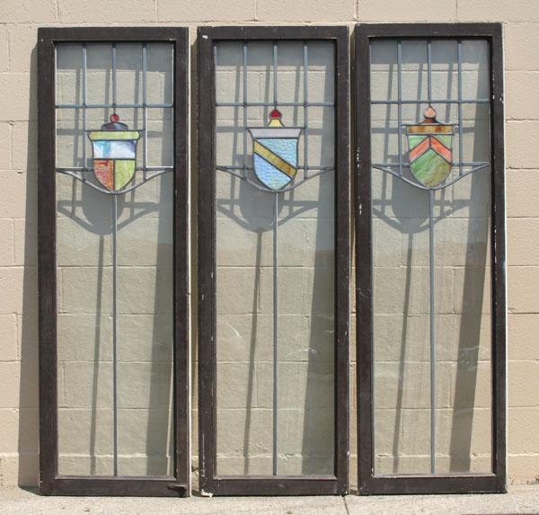 Three large windows with stained