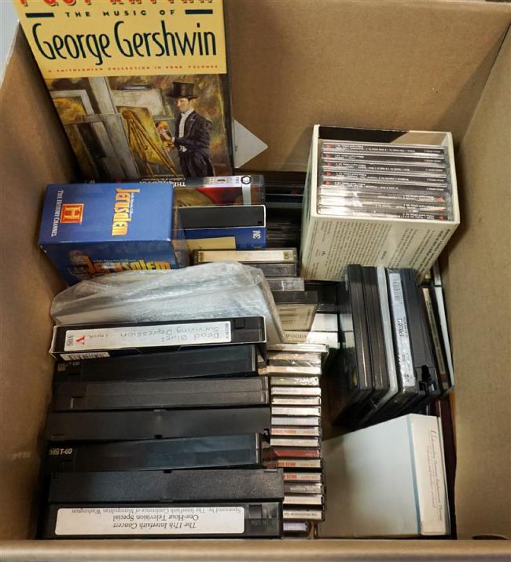 GROUP WITH CDS AND VHS TAPESGroup with