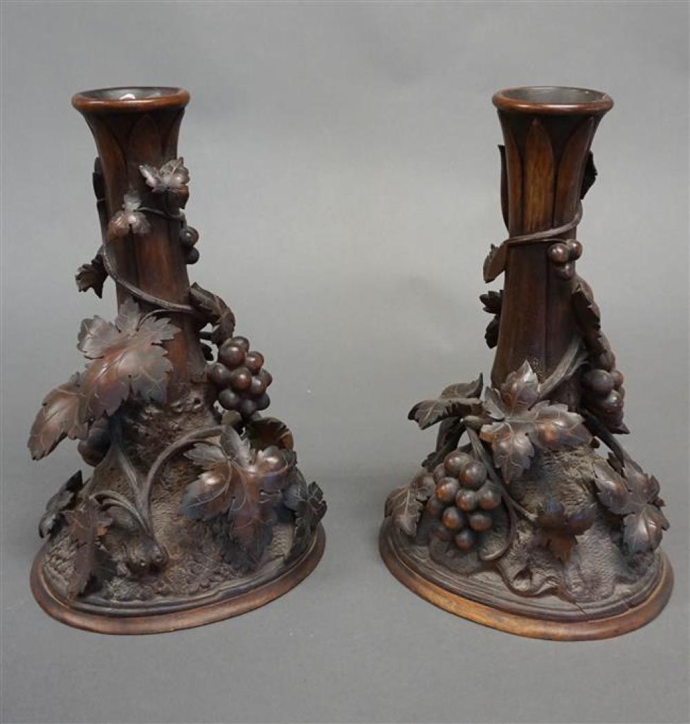 TWO BLACK FOREST WOOD CARVED CANDLESTICKS,