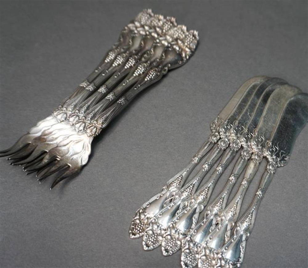 FIVE STERLING SEAFOOD FORKS AND SIX