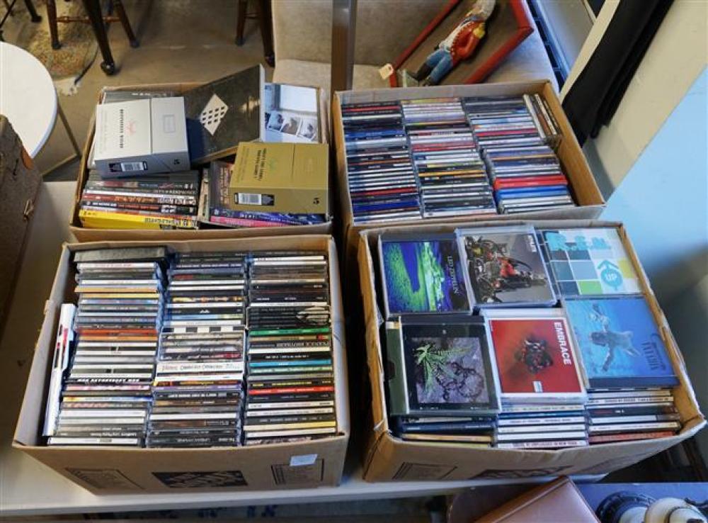 FOUR BOXES OF CDS AND DVDSFour