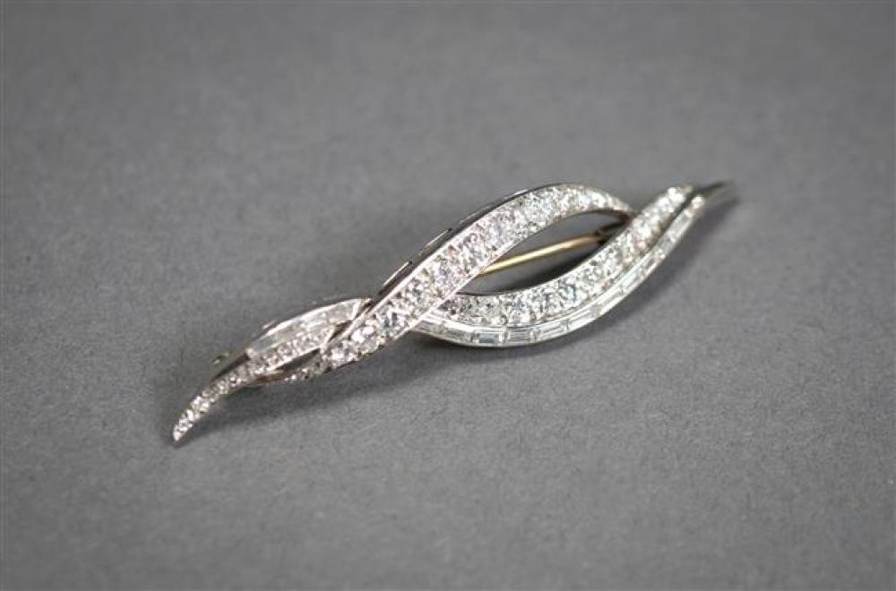 TESTED PLATINUM AND DIAMOND BROOCH,