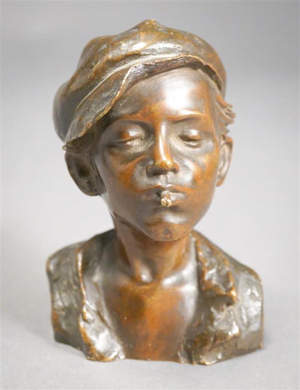 BRONZE BUST OF A YOUNG MAN, SIGNED