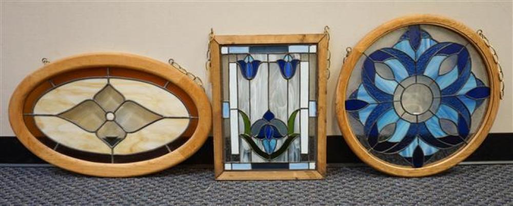 THREE FRAMED LEADED GLASS PANELSThree