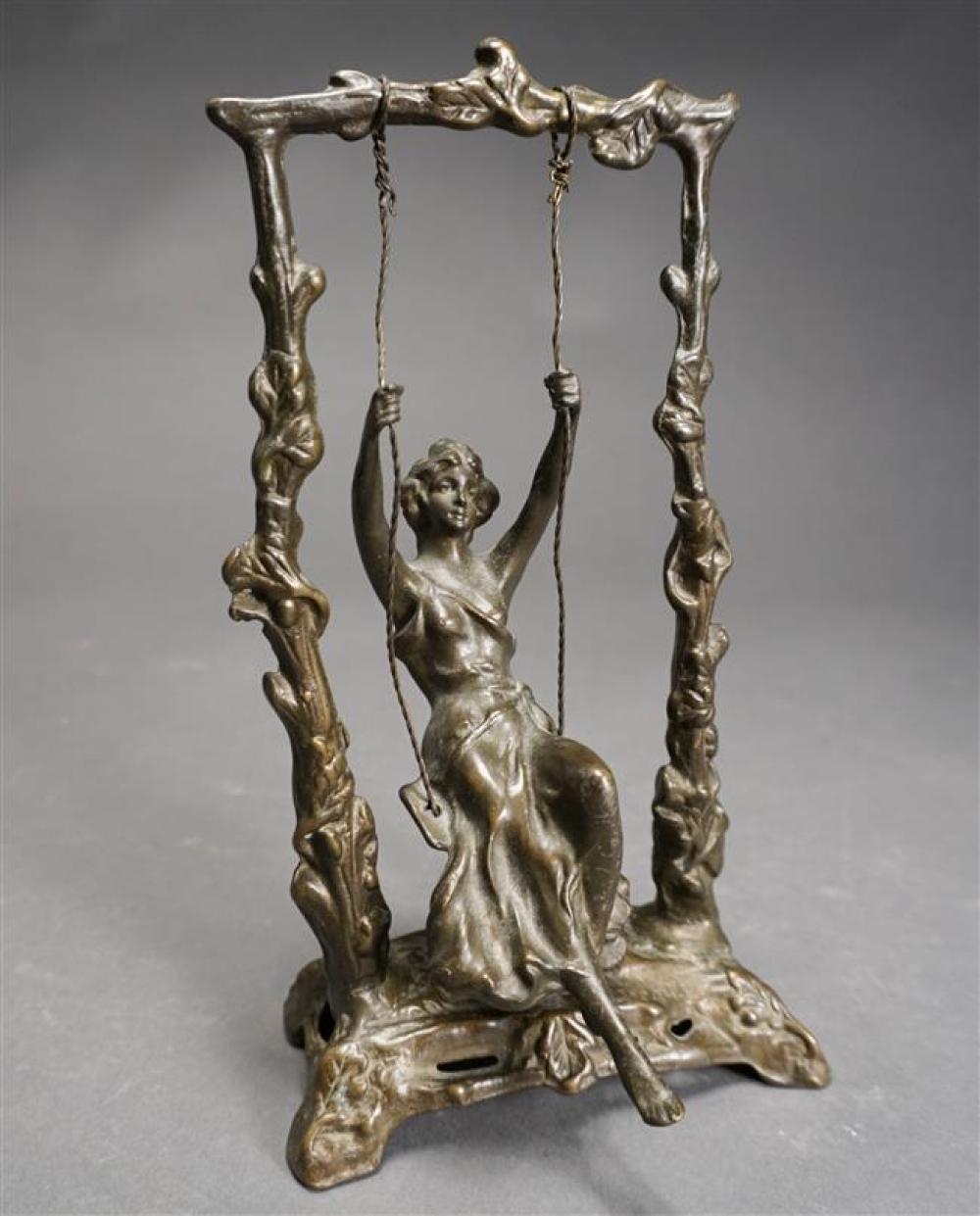 BRONZE SCULPTURE OF LADY ON A SWING,