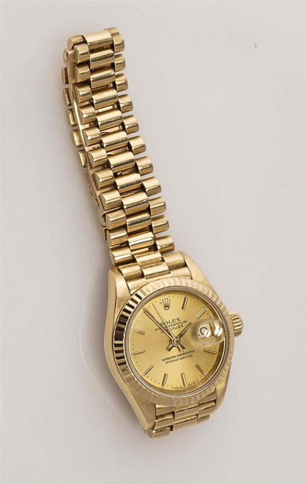 LADY'S 18-KARAT YELLOW-GOLD AUTOMATIC