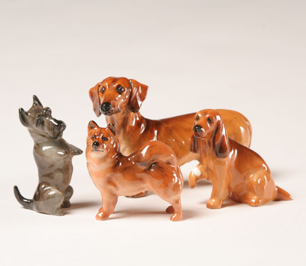 Royal Doulton porcelain dogs; four purebreds