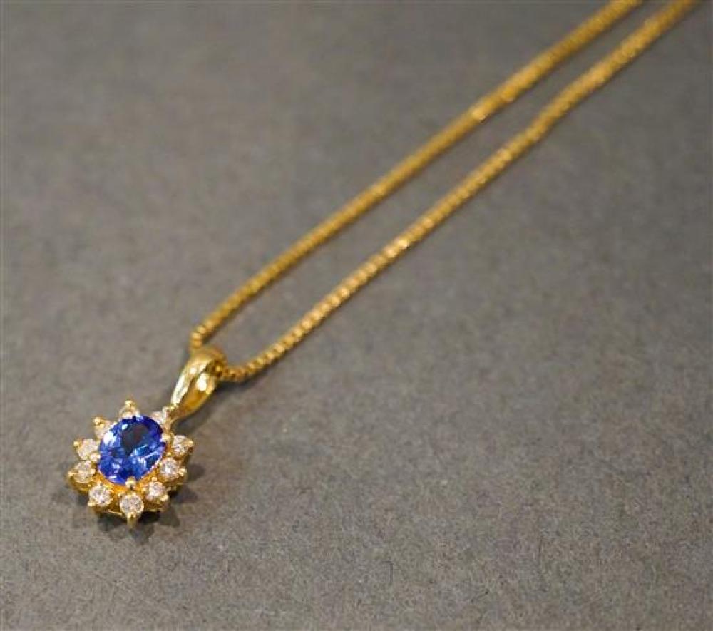 14 KARAT YELLOW GOLD TANZANITE 320dd2