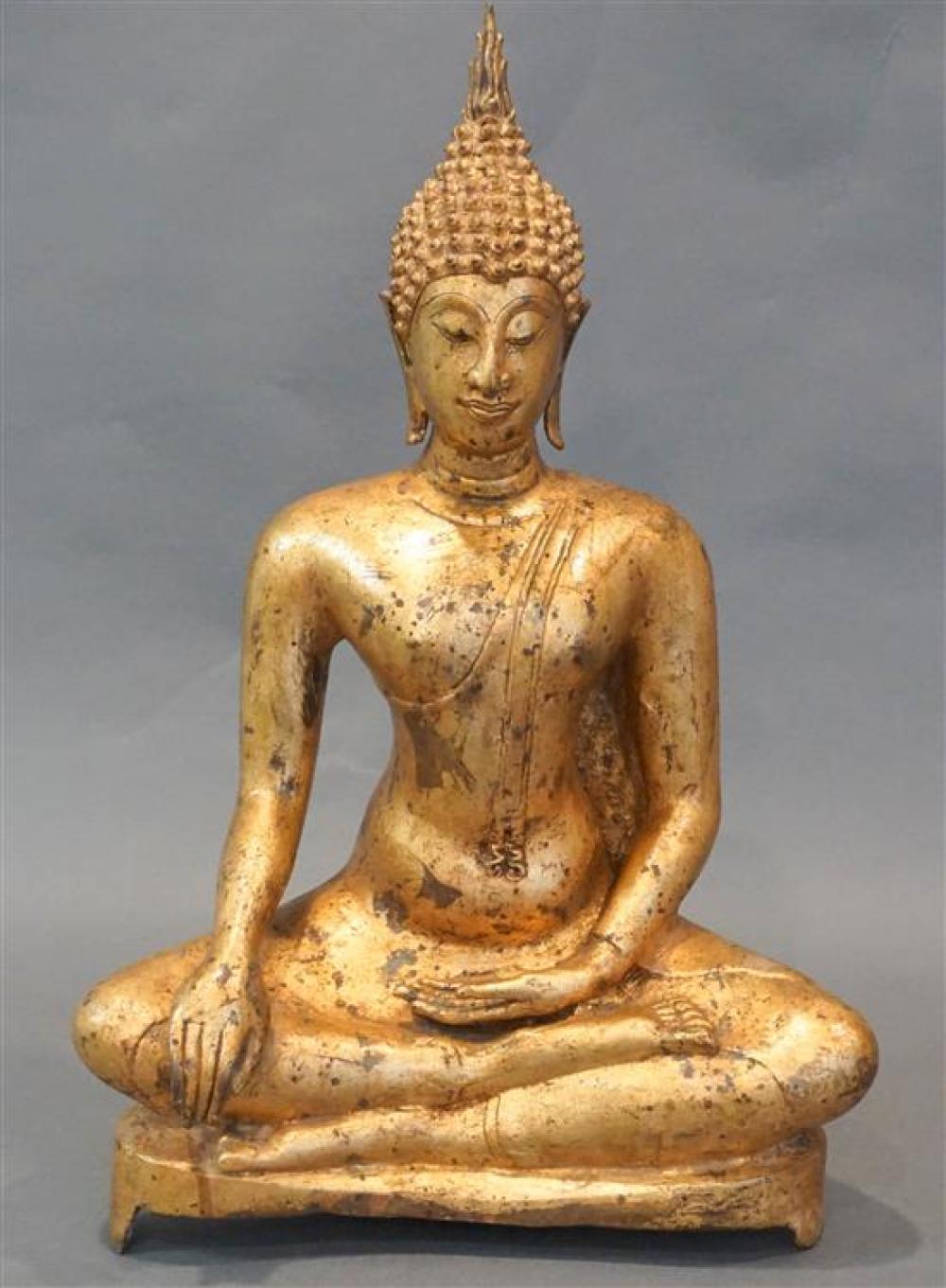 THAI GILT IRON FIGURE OF A SEATED