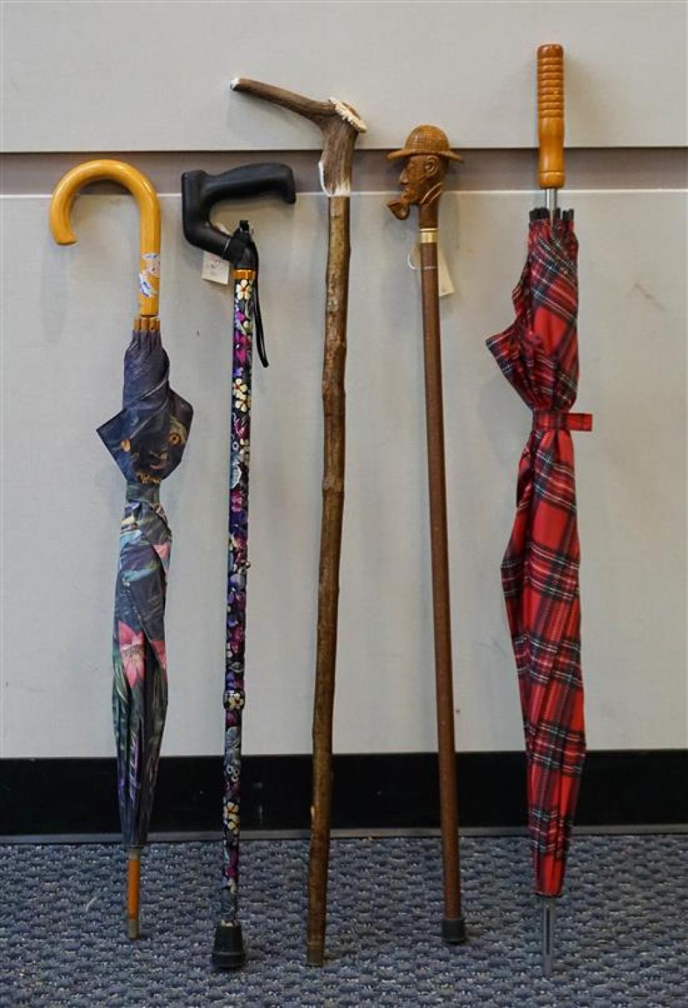 FOUR ASSORTED CANES AND TWO UMBRELLASFour