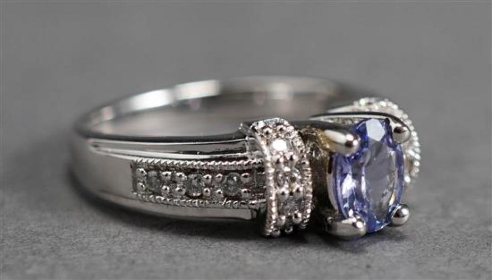 14 KARAT WHITE GOLD TANZANITE AND 3216d1