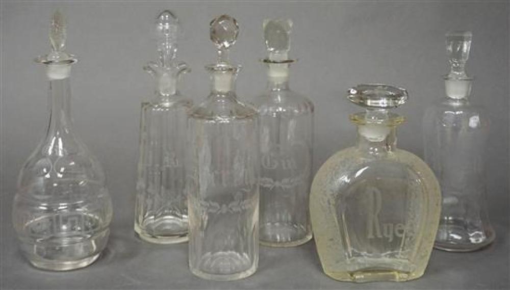 SIX ASSORTED ETCHED CRYSTAL DECANTERSSix
