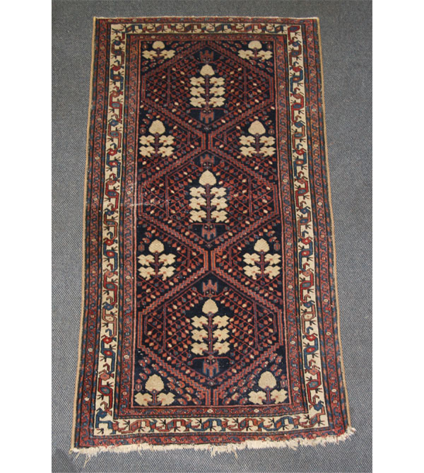 Hand woven oriental rug; semi-antique,