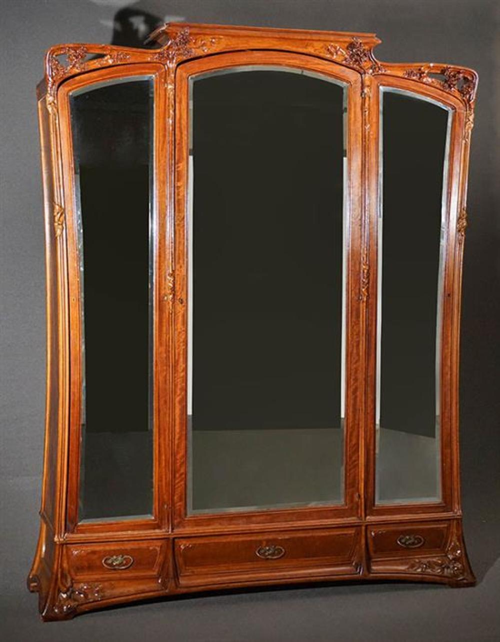 LOUIS MAJORELLE CARVED AND FIGURED MAHOGANY