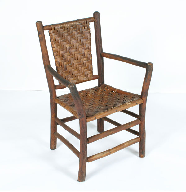 Old hickory arm chair; woven seat