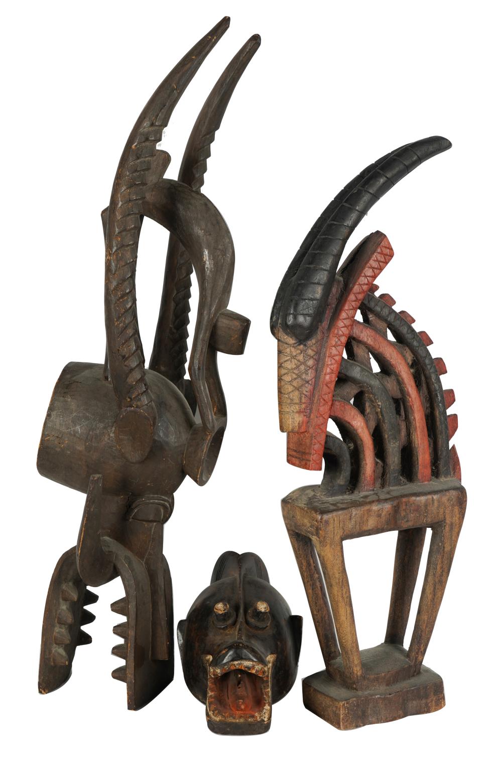 THREE AFRICAN-PAINTED WOOD CARVINGScomprising