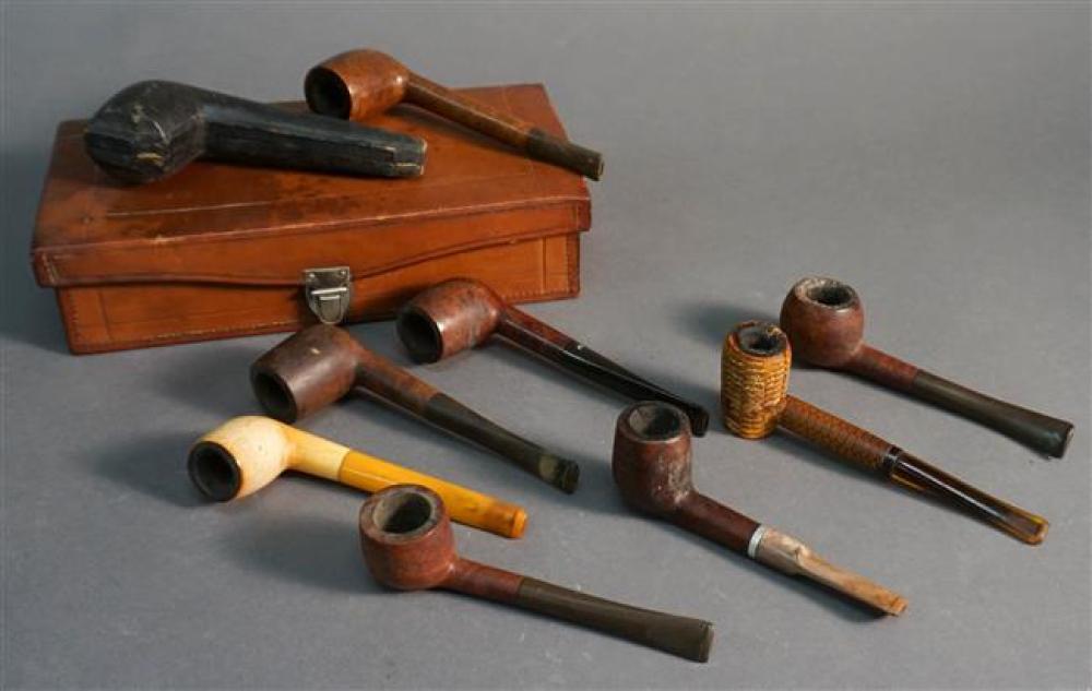 COLLECTION OF SMOKING PIPES IN A LEATHER