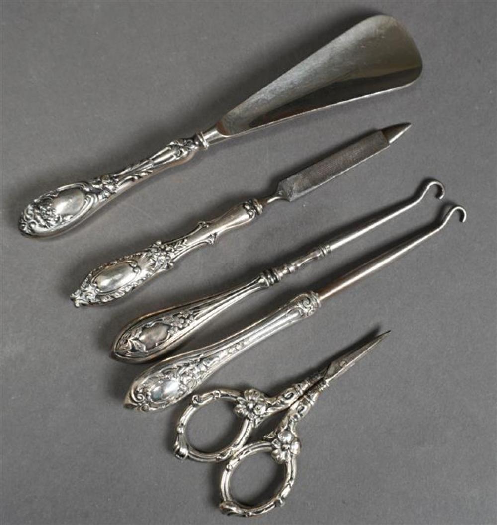 GROUP WITH FIVE ORNATE STERLING 324c06