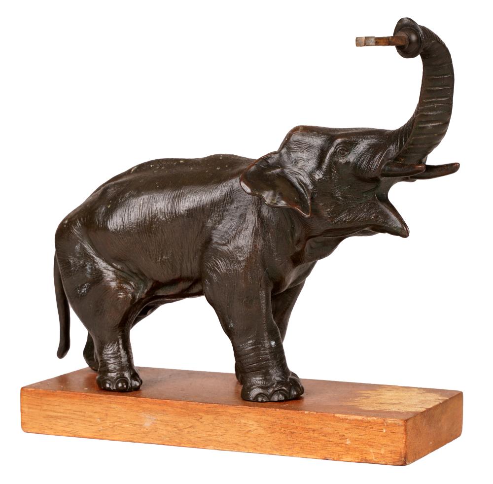 PATINATED BRONZE FIGURE OF AN ELEPHANTmounted 324ca3