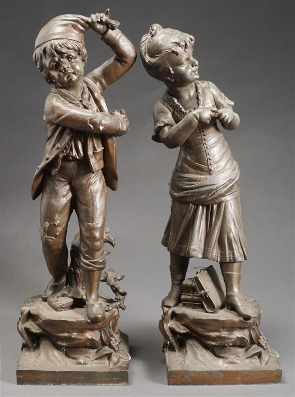 PAIR OF PATINATED SPELTZER FIGURES OF