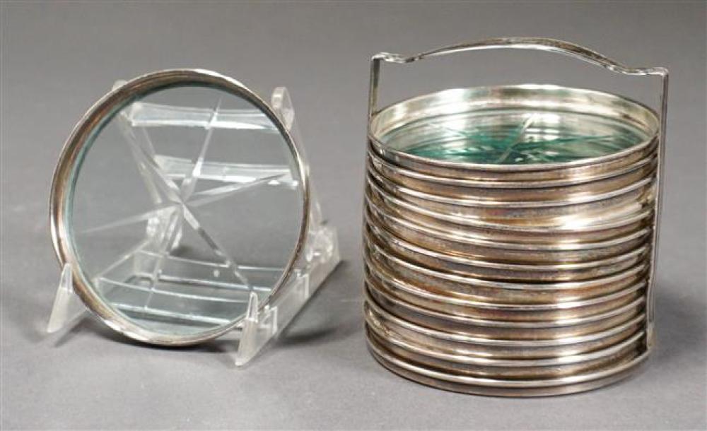 TWELVE STERLING MOUNTED GLASS COASTERS
