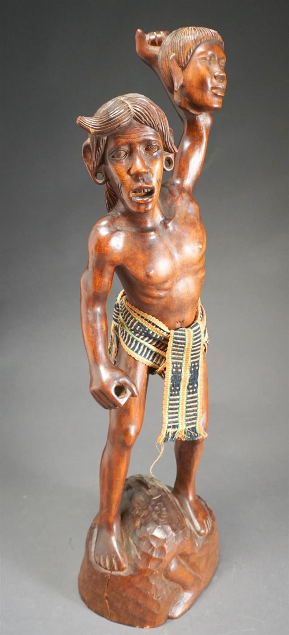 CARVED WOOD FIGURE OF A WARRIOR,