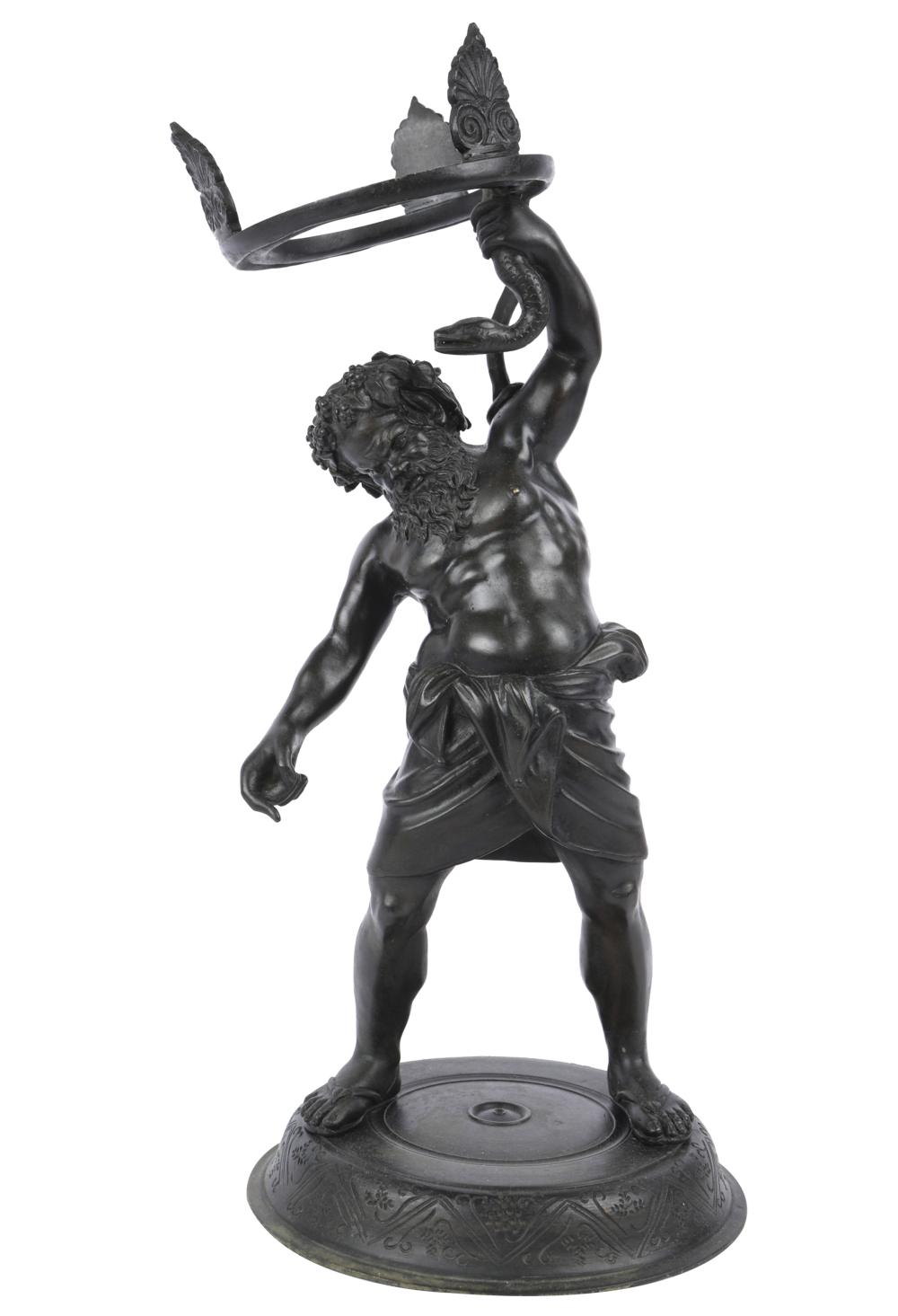 BRONZE FIGURE OF A MAN WITH SERPENTunsigned  32567d