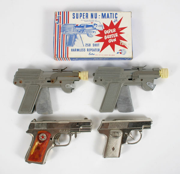 Vintage toy metal cap guns; two Nu-Matic