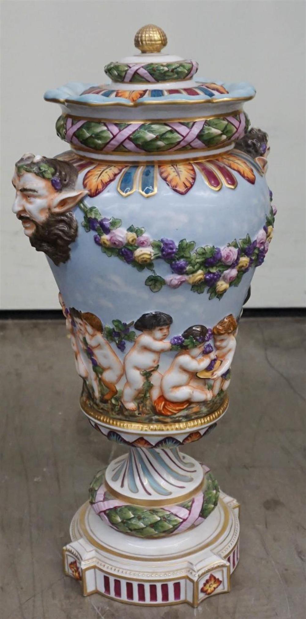 CONTINENTAL PUTTI COVERED URN,