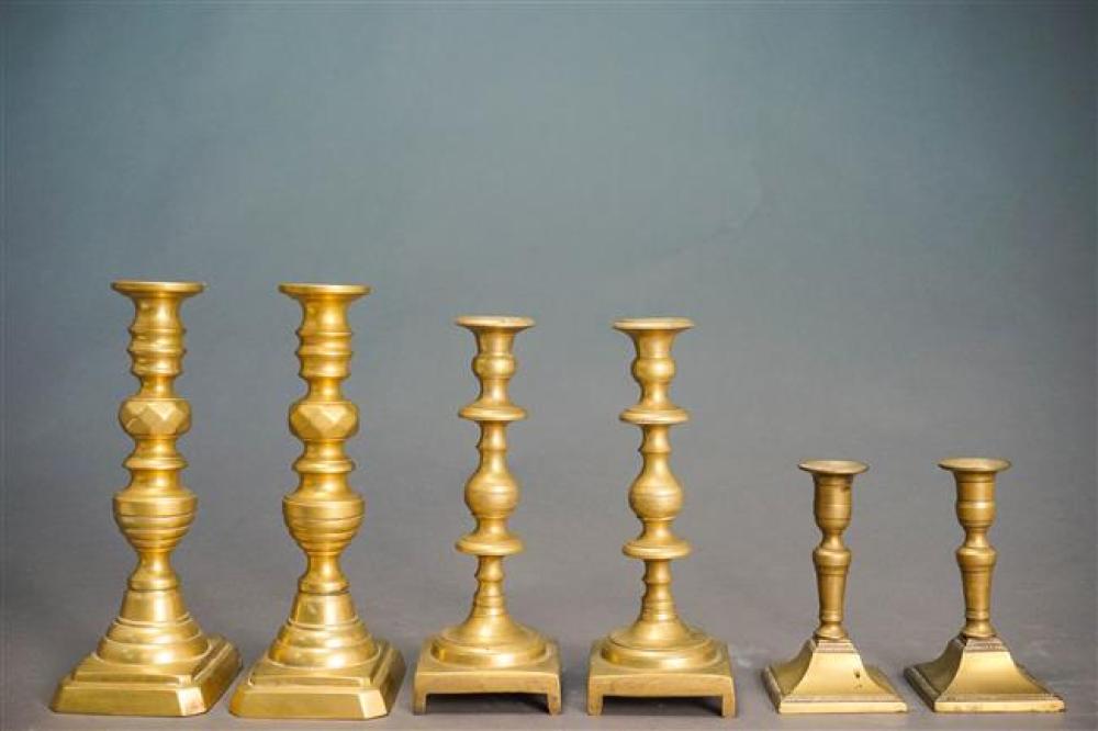 SIX BRASS CANDLEHOLDERS, HEIGHT OF TALLER: