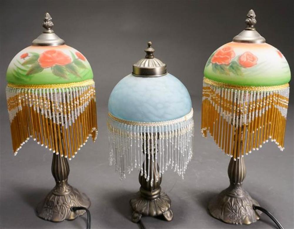 THREE PATINATED METAL BOUDOIR LAMPS