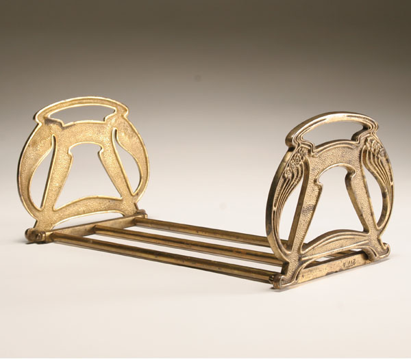 Art Nouveau adjustable brass bookends,