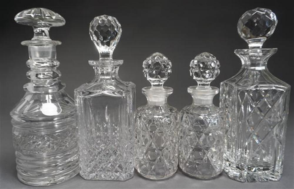 FIVE ASSORTED CRYSTAL DECANTERS,