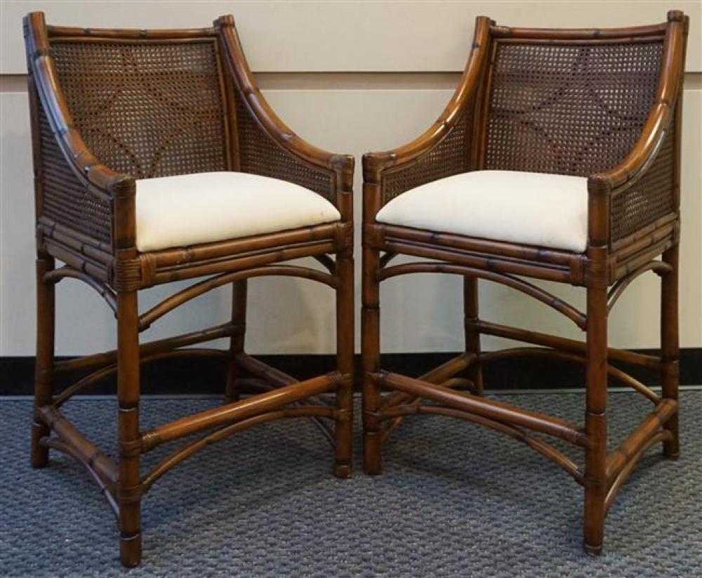 PAIR RATTAN AND CANE ARMCHAIRSPair