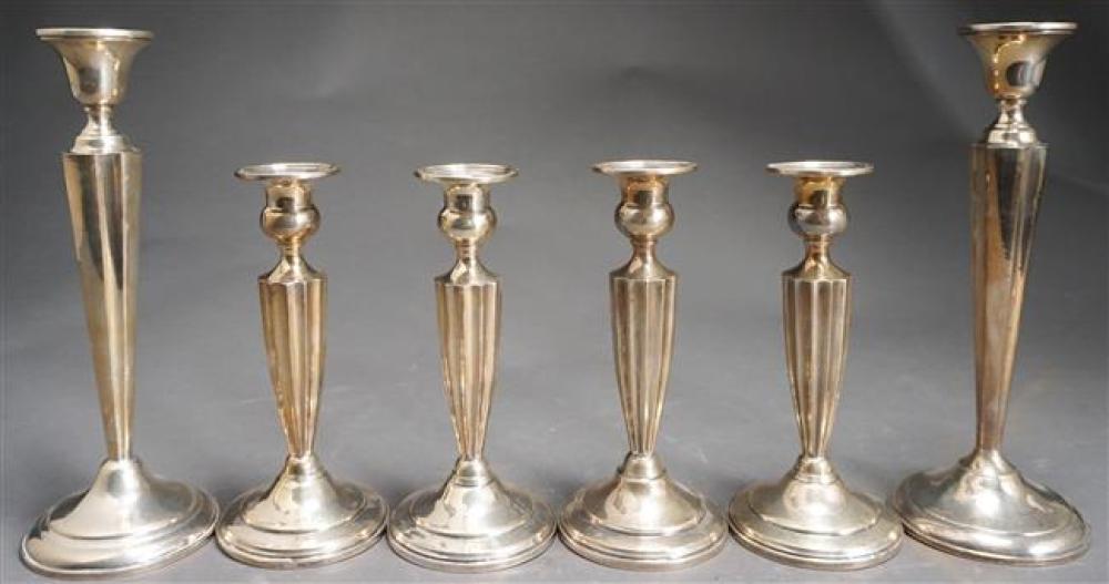 THREE PAIRS WEIGHTED STERLING CANDLESTICKSThree