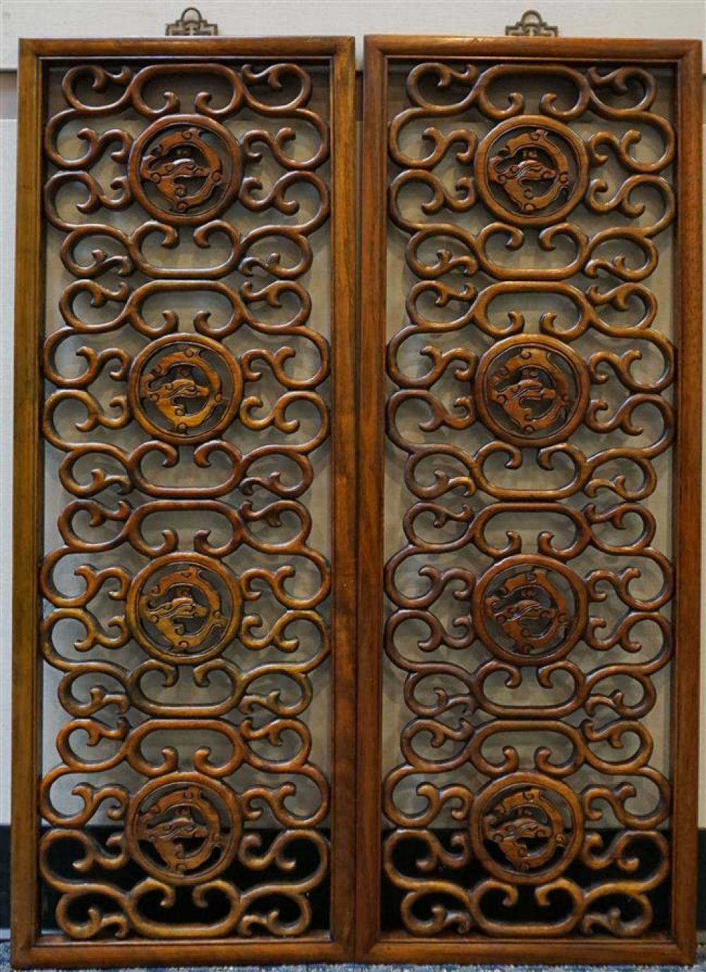 TWO CHINESE CARVED HARDWOOD PANELS,